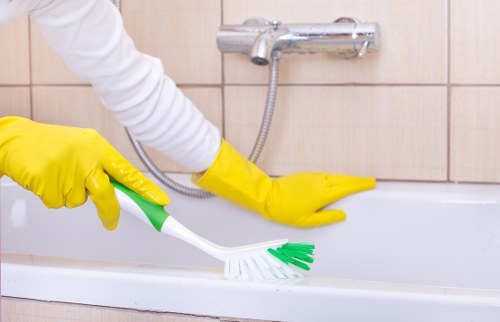 Detailed post-construction cleaning in W6 for kitchen surfaces and fixtures